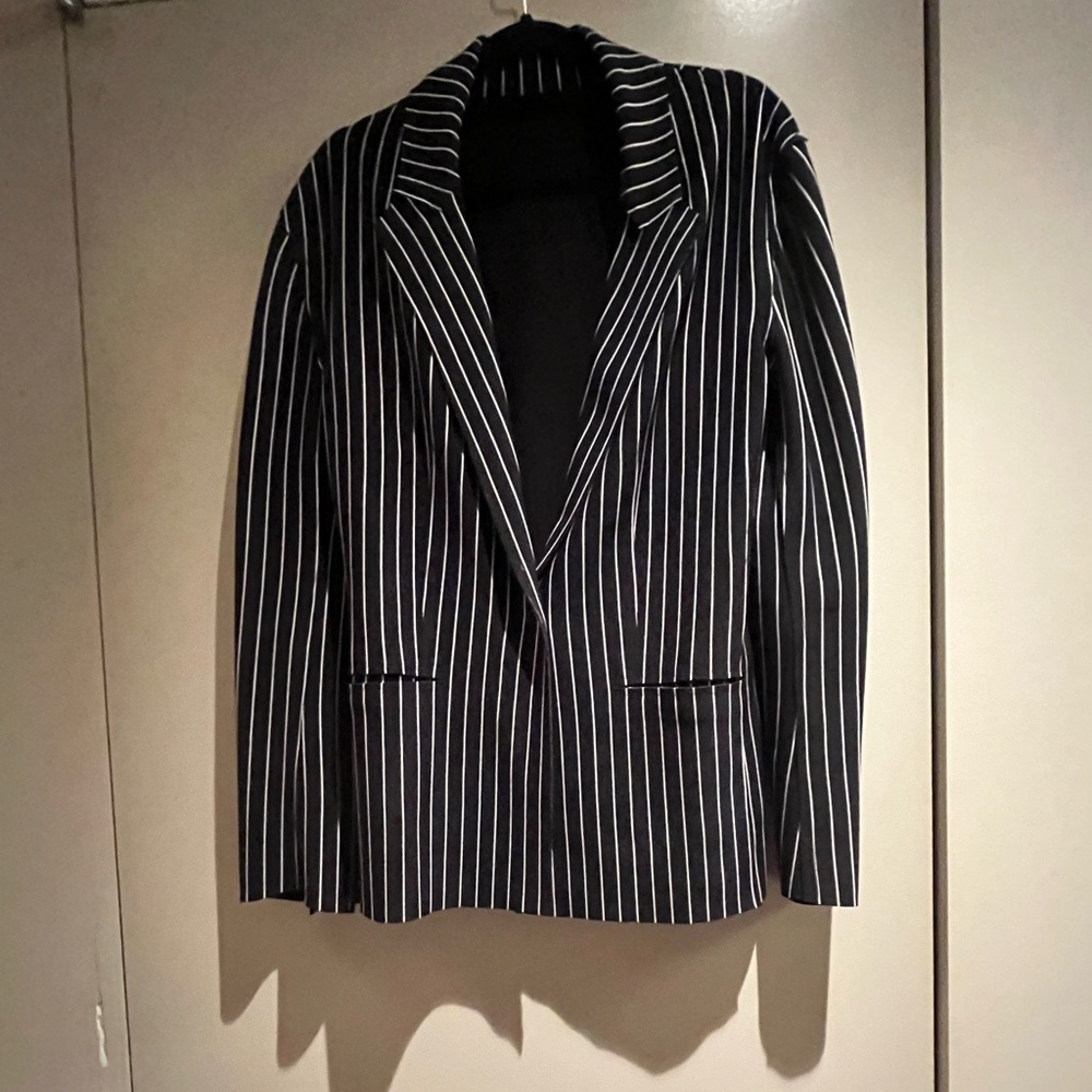 Norma Kamali’s pinstripe blazer